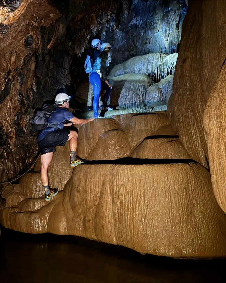 Technical expedition movement through flooded cave systems.