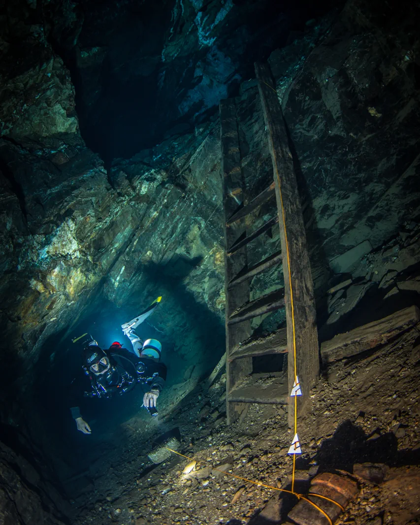 Flooded historic mine galleries inside Mina da Passagem, Brazil.